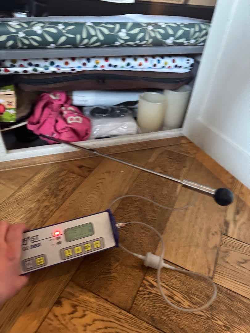 Tracer-gas analyser beside fitted joinery